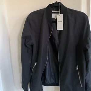 New with tags. Never worn. I got for Xmas and I’m more of an XL. Negotiable.